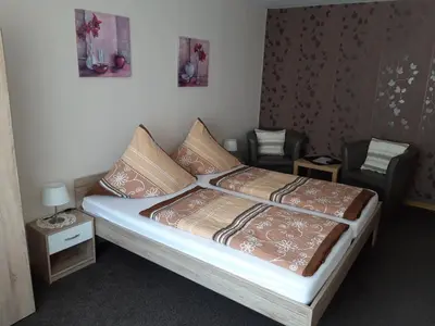 Ein Bett oder Betten in einem Zimmer der Unterkunft Pension Heib