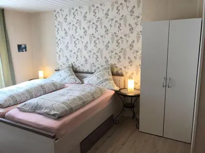Ein Bett oder Betten in einem Zimmer der Unterkunft Winzerschenke