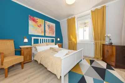 Ein Bett oder Betten in einem Zimmer der Unterkunft FerienNest Haus Braunfels