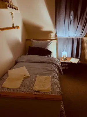 Ein Bett oder Betten in einem Zimmer der Unterkunft FerienNest Haus Braunfels