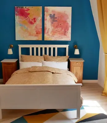 Ein Bett oder Betten in einem Zimmer der Unterkunft FerienNest Haus Braunfels