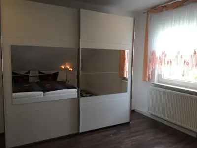 Ein Bett oder Betten in einem Zimmer der Unterkunft Ferienwohnung Vetter