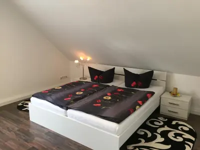 Ein Bett oder Betten in einem Zimmer der Unterkunft Ferienwohnung Vetter