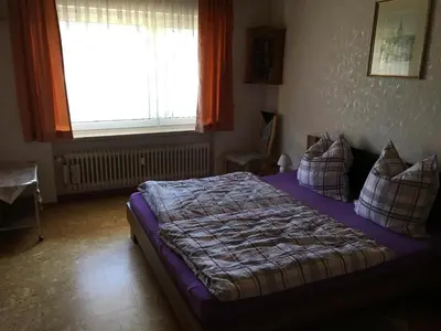 Ein Bett oder Betten in einem Zimmer der Unterkunft Ferienwohnungen Hehner