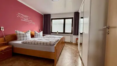 Ein Bett oder Betten in einem Zimmer der Unterkunft Ferienwohnungen Hoefchen