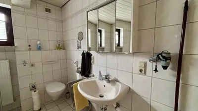Ein Badezimmer in der Unterkunft Ferienwohnungen Hoefchen