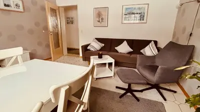 Ein Sitzbereich in der Unterkunft Ferienwohnungen Hoefchen