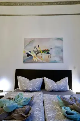 Ein Bett oder Betten in einem Zimmer der Unterkunft Fewo Waldesruh