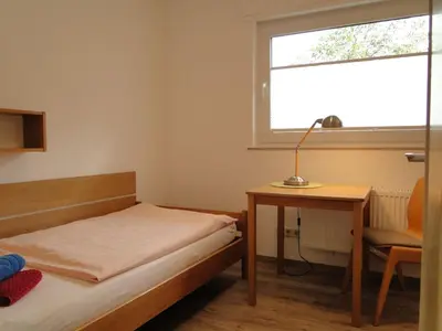 Ein Bett oder Betten in einem Zimmer der Unterkunft Haus St. Josef