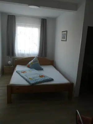 Ein Bett oder Betten in einem Zimmer der Unterkunft Gasthaus zur Krone