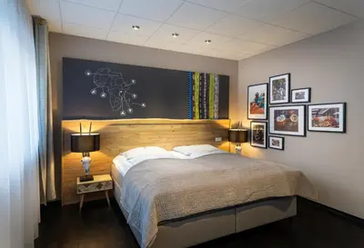 Ein Bett oder Betten in einem Zimmer der Unterkunft Food Hotel