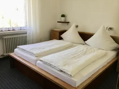 Ein Bett oder Betten in einem Zimmer der Unterkunft Mosel-Appartements Nehren