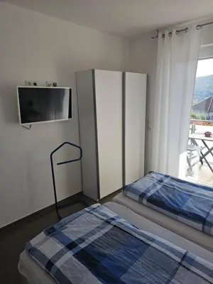 Ein Bett oder Betten in einem Zimmer der Unterkunft FeWo Lena