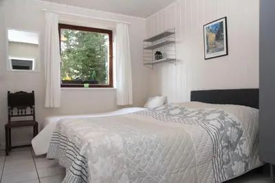 Ein Bett oder Betten in einem Zimmer der Unterkunft Ferienhaus am Maibüsch - rollstuhlgerecht