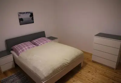 Ein Bett oder Betten in einem Zimmer der Unterkunft Ferienhaus am Kreuzberg - Nürburgring