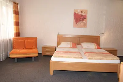 Ein Bett oder Betten in einem Zimmer der Unterkunft Alte Winzerschenke