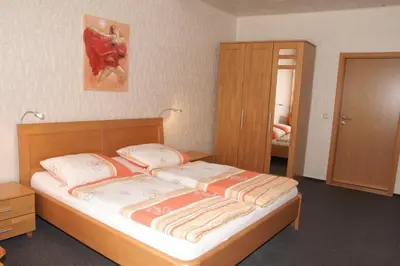 Ein Bett oder Betten in einem Zimmer der Unterkunft Alte Winzerschenke