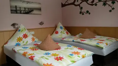 Ein Bett oder Betten in einem Zimmer der Unterkunft Hotel Andernacher Hof