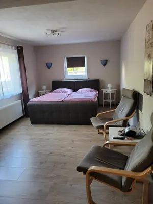 Ein Bett oder Betten in einem Zimmer der Unterkunft Ferienwohnung Loreley