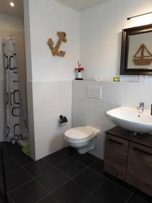 Ein Badezimmer in der Unterkunft Ferienwohnung 