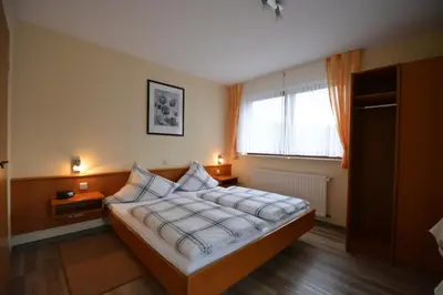 Ein Bett oder Betten in einem Zimmer der Unterkunft Weingut***Pension Günther Scholtes
