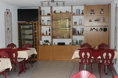 Ein Restaurant oder anderes Speiselokal in der Unterkunft Weingut***Pension Günther Scholtes