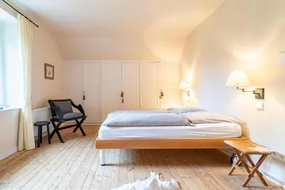 Ein Bett oder Betten in einem Zimmer der Unterkunft Landhaus Camillas Höhe