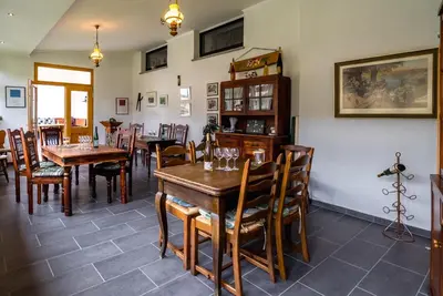Ein Restaurant oder anderes Speiselokal in der Unterkunft Ferienweingut Göbel