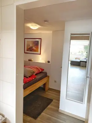 Ein Bett oder Betten in einem Zimmer der Unterkunft Ferienwohnung An der Pferdsweide