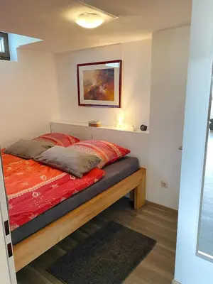 Ein Bett oder Betten in einem Zimmer der Unterkunft Ferienwohnung An der Pferdsweide