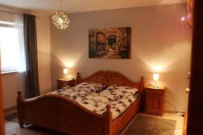 Ein Bett oder Betten in einem Zimmer der Unterkunft Ferienwohnung 