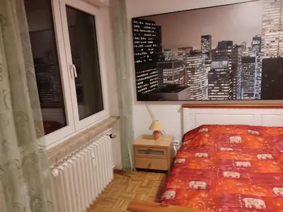 Ein Bett oder Betten in einem Zimmer der Unterkunft Lotus