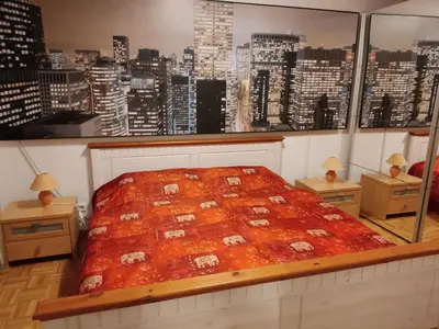 Ein Bett oder Betten in einem Zimmer der Unterkunft Lotus