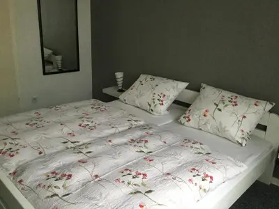Ein Bett oder Betten in einem Zimmer der Unterkunft Pension Graef
