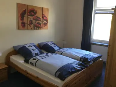 Ein Bett oder Betten in einem Zimmer der Unterkunft Pension Graef