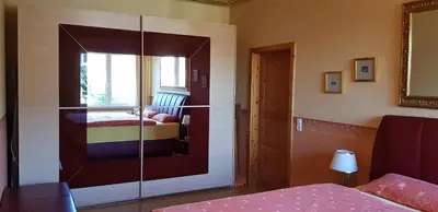 Ein Bett oder Betten in einem Zimmer der Unterkunft Ferienwohnungen Gronen