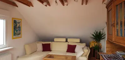 Ein Sitzbereich in der Unterkunft Ferienwohnungen Gronen