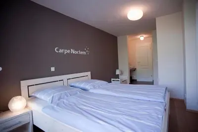 Ein Bett oder Betten in einem Zimmer der Unterkunft Ferienhaus Cuxborn 7