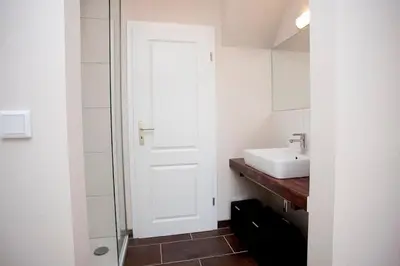 Ein Bett oder Betten in einem Zimmer der Unterkunft Ferienhaus Cuxborn 7