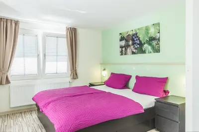 Ein Bett oder Betten in einem Zimmer der Unterkunft Altes Schulhaus