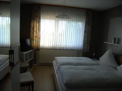 Ein Bett oder Betten in einem Zimmer der Unterkunft Pension Kölzer