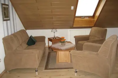 Ein Sitzbereich in der Unterkunft Ferienwohnung in der Vulkaneifel