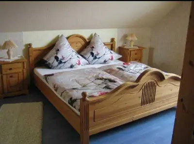 Ein Bett oder Betten in einem Zimmer der Unterkunft Ferienwohnung Haus Andre - für 4 Personen