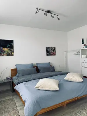 Ein Bett oder Betten in einem Zimmer der Unterkunft Ferienhaus Plan B. Wittlich