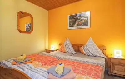 Ein Bett oder Betten in einem Zimmer der Unterkunft Ferienhaus 18 In Thalfang