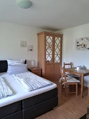 Ein Bett oder Betten in einem Zimmer der Unterkunft Haus Grünewald