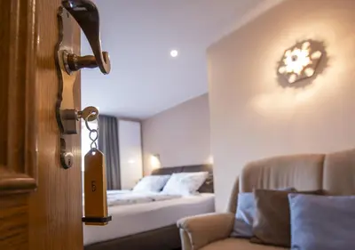 Ein Bett oder Betten in einem Zimmer der Unterkunft Das Gästehaus in Valwig