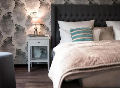 Ein Bett oder Betten in einem Zimmer der Unterkunft Das Landhaus Apartments