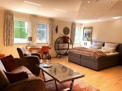 Ein Sitzbereich in der Unterkunft Das Landhaus Apartments