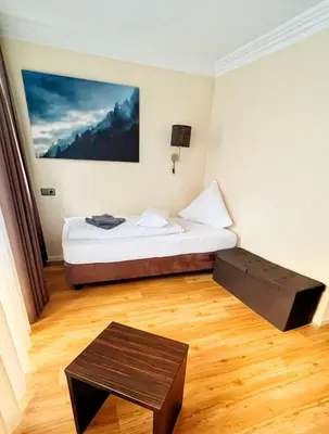 Ein Bett oder Betten in einem Zimmer der Unterkunft Bacharacher Hof